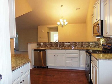 Kitchen. Beautiful maple chiffon cabinets, granite