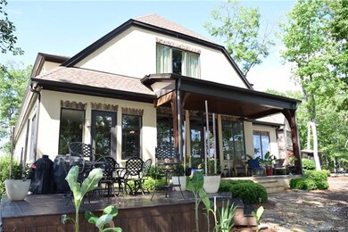 You'll love the covered porch, patio and amazing l