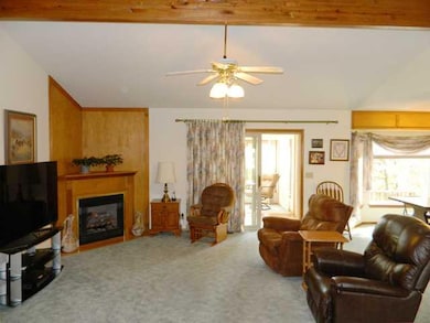 Living Room. Vaulted and beamed ceiling are a nice feature