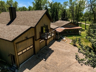 Front exterior aerial from guest/shop/garage side
