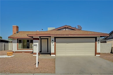 Ranch-style home with an attached garage, driveway, a chimney, stucco siding, and a shingled roof