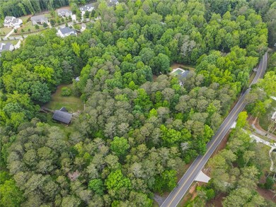 Bird's eye view featuring a view of trees