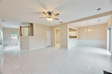 Unfurnished living room with a decorative wall, a 