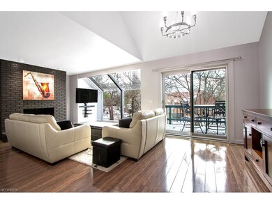 Main floor living room; sliding door leads to deck
