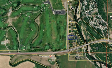 Aerial map of property and surrounding area featuring Cottonwood Hills Golf Course to the West and Gallatin River to the East. The property boundaries are highlighted in blue.