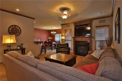 Living area with Wood Floor, Surround Sound, Firep