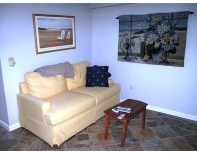 Living Room. Pullout couch, new tile floor and AC