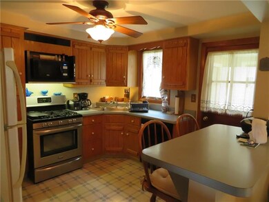 Custom cabinets, breakfast bar, new stove and acce