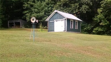 wood shed and a barn