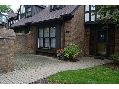 Exterior Front. End unit with a private courtyard.