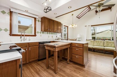 Country kitchen open to family room