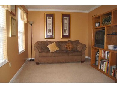 Den. Adjacent to entrance hall, tranquil den for r