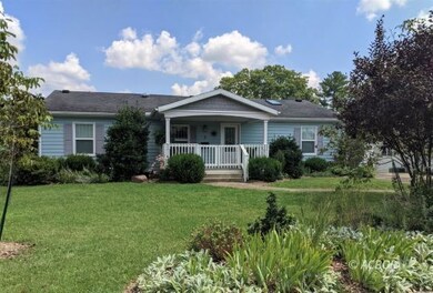 Front of house from street w/gardens