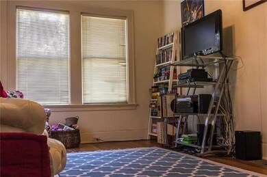 Sitting room with wood finished floors