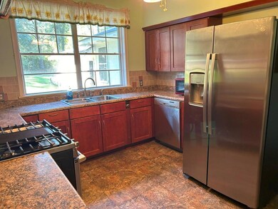Kitchen featuring stainless steel appliances, sink