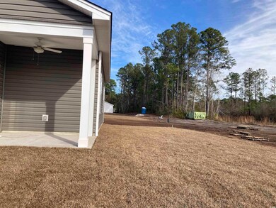 View of yard featuring ceiling fan