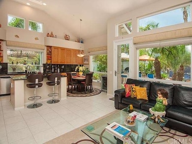 open and bright kitchen with a custom bay window. 