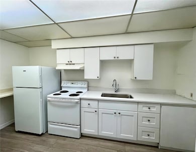 New light cabinets and stone countertops
