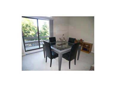 Formal dining room with an abundance of natural li