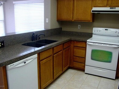 Kitchen looking into Breakfast area