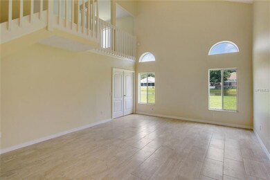 Large family room with views to pond and french do
