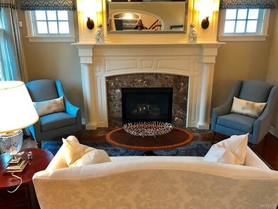 This is a custom detailed gas fireplace with detai