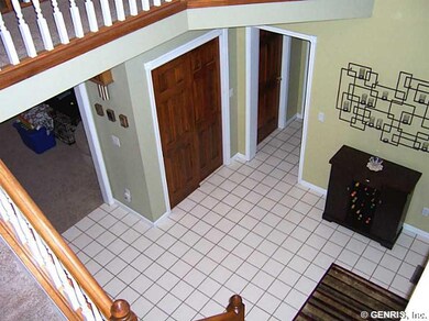 Foyer. Balcony looks down on foyer and great room 
