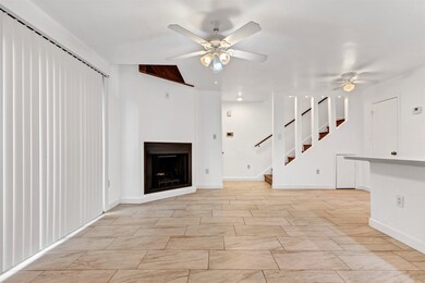 Staircase leading to the second floor, with a conv