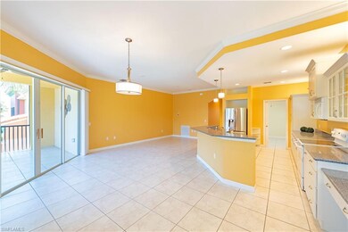 Great Room open to kitchen and large screened lana