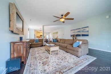 Open layout, featuring engineered hardwood floors,