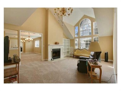 Photo. Den with cathedral ceilings, wood burning f