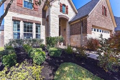 Brick and stone front elevation.