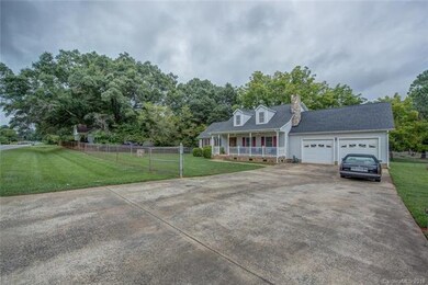 Large front and side yard, completely fenced in.