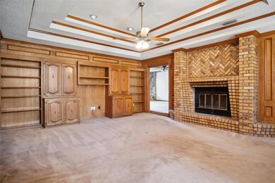 Spacious Living Area featuring built in shelves, c
