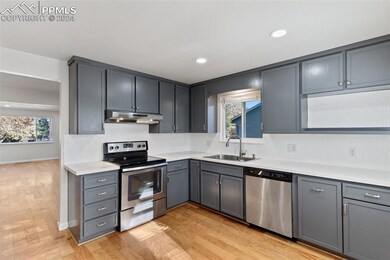 Kitchen featuring a wealth of natural light, light
