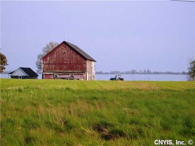 Exterior Front. Building to the left of the barn i