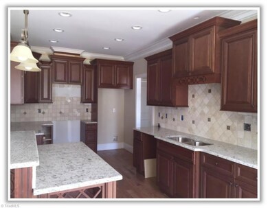 Stainless appliances will include a range, dishwasher and built-in microwave.