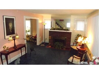Living Room. Formal living room features a woodbur