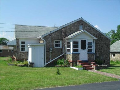 Exterior Front. Side of home with enclosed porch