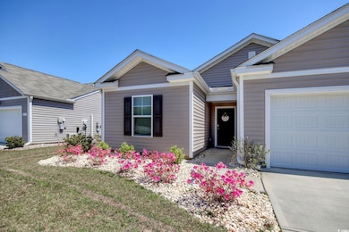 Ranch-style house featuring an attached garage and