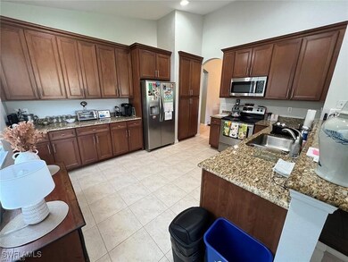 Kitchen featuring appliances with stainless steel