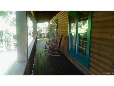 Covered Front Porch to Entrance Foyer