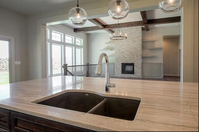 Open Floor Plan. Photos are of a previous model no