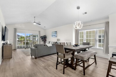 Dining area with light hardwood / wood-style floor