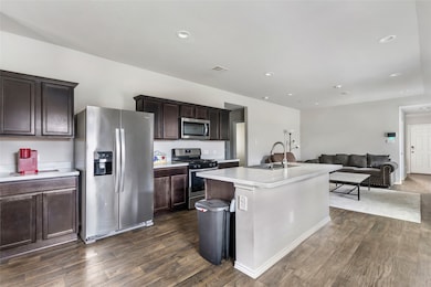 Kitchen and family room view.