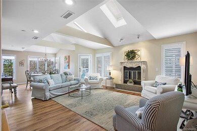 Bright and sunny with skylights and beautiful hardwood floors.