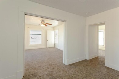 Spare room with a healthy amount of sunlight, carp