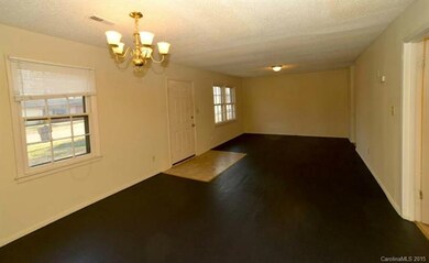 Living Room with closets and freshly painted floor