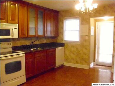 Very nice remodeled kitchen has cherry cabinets, g