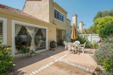 Two large sliding glass doors plus windows look ou